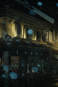 蔵造りのお店の雪景色